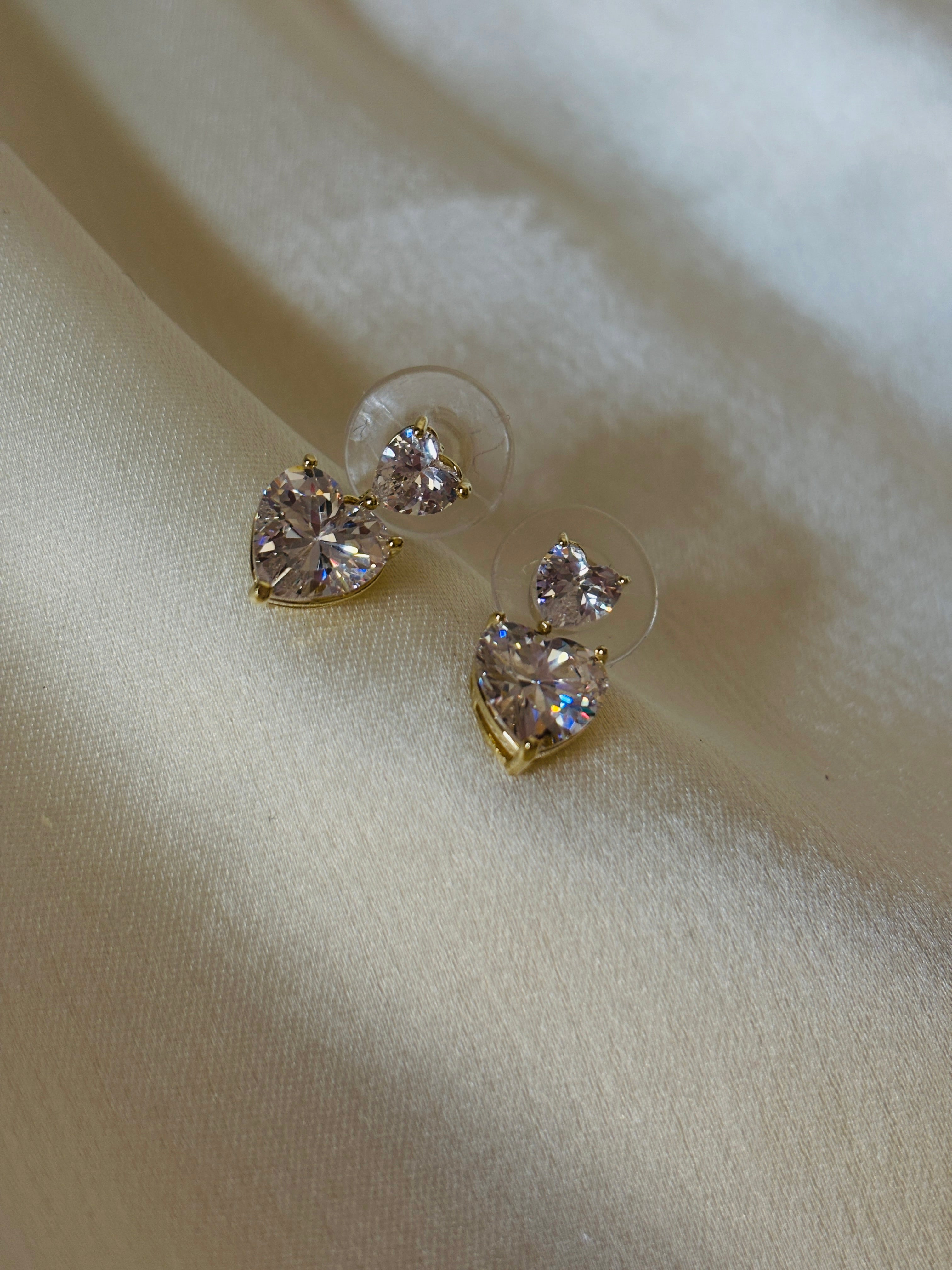 Heat solitaire earring