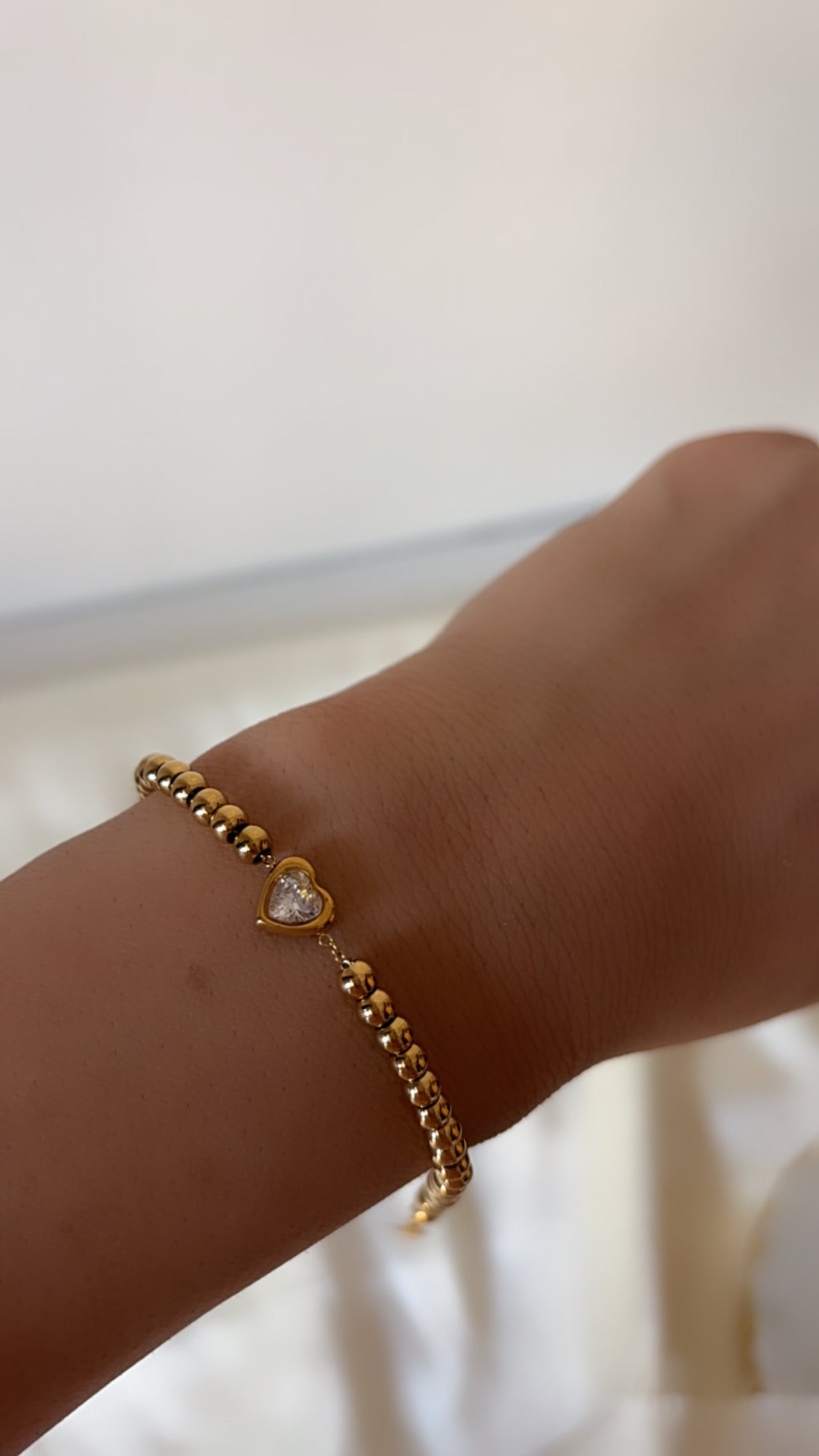 Heart with beaded bracelet