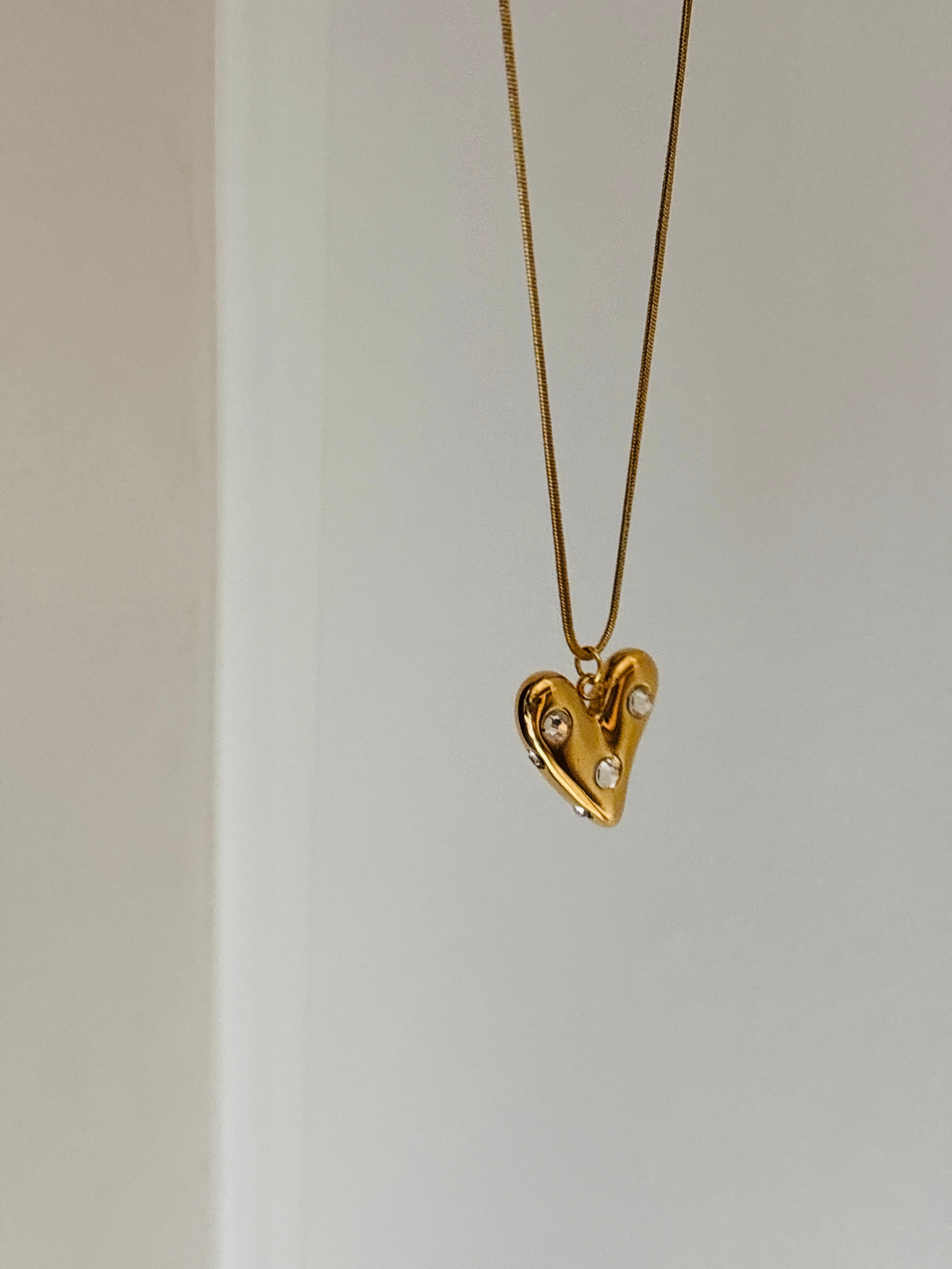 Ruhi heart charm necklace