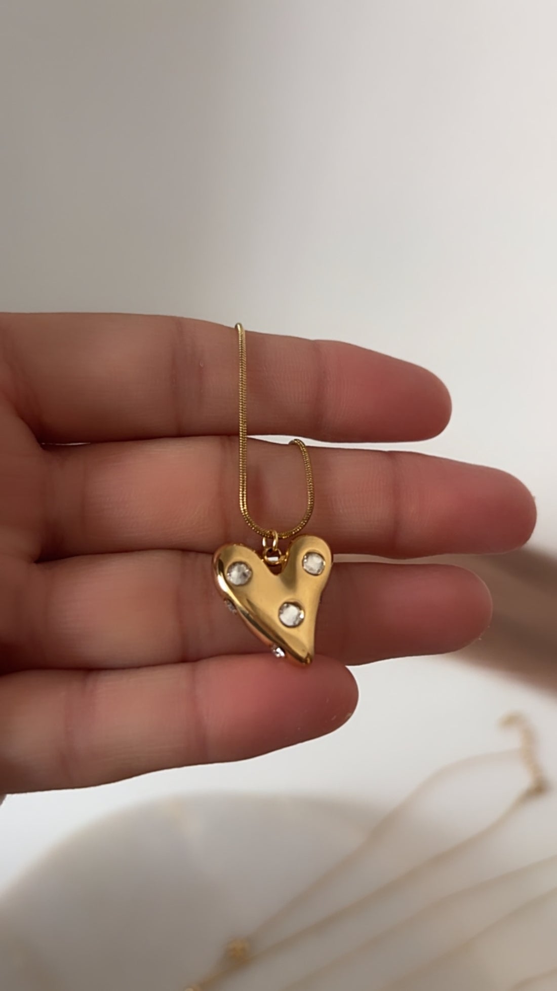 Ruhi heart charm necklace