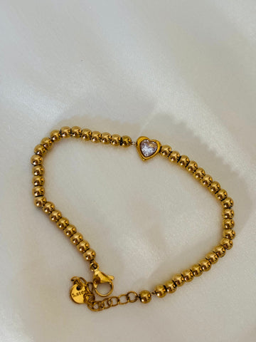 Heart with beaded bracelet