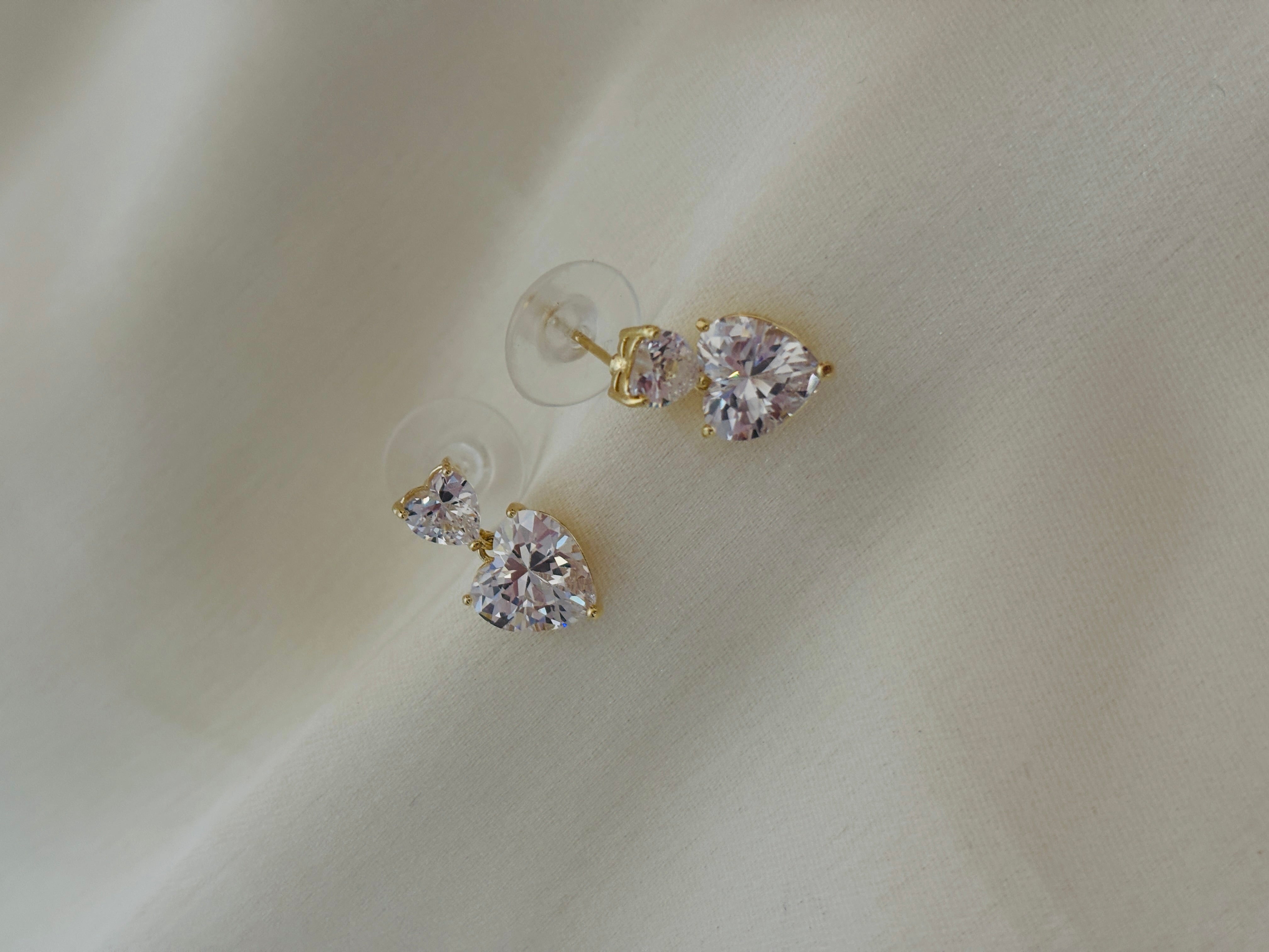 Heat solitaire earring