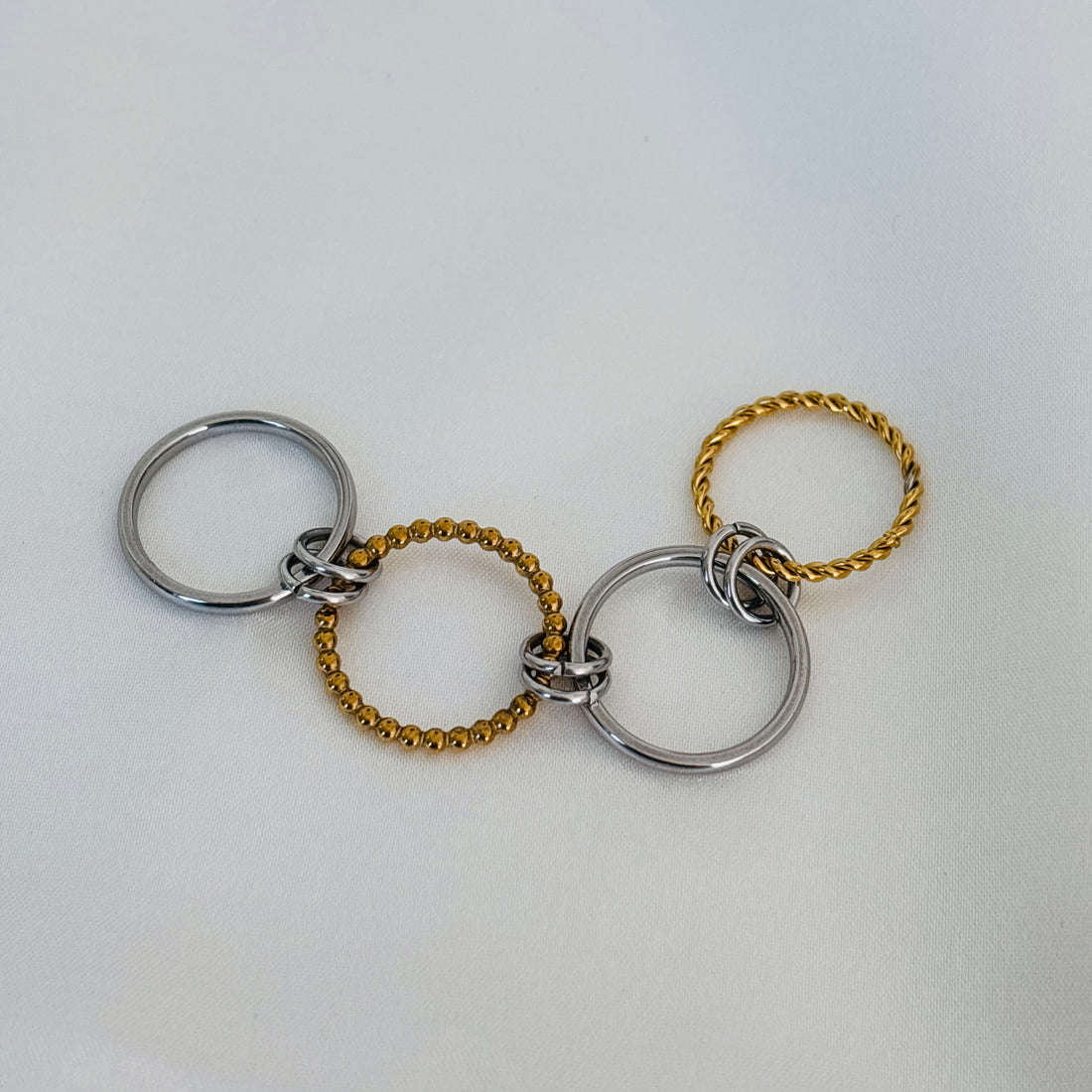 Two tone set of four ring
