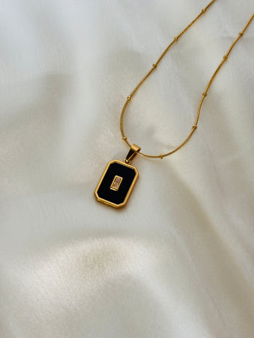 Black enamel charm necklace